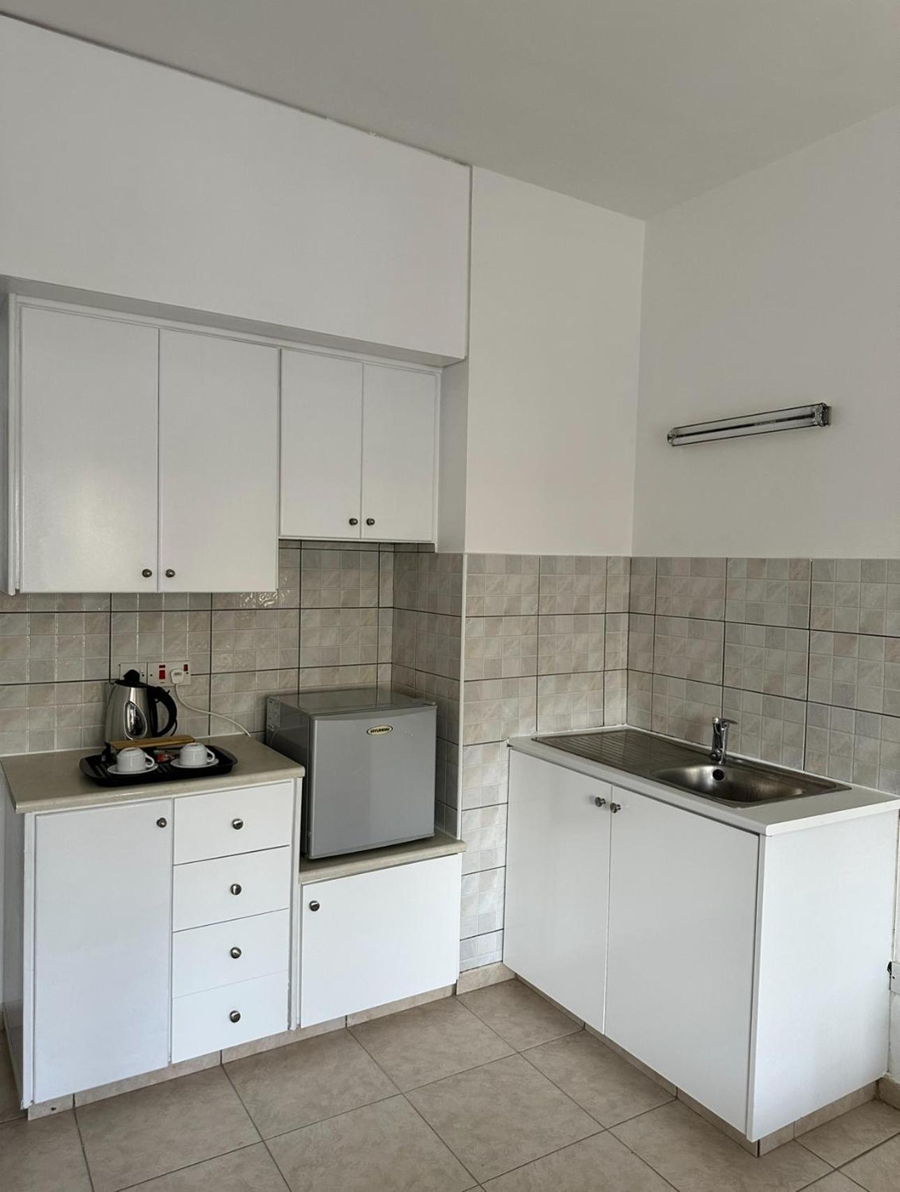 New York Plaza Hotel Apartments Paphos Bagian luar foto